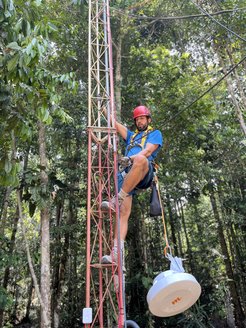 Tarek El-Madany installing a new antenna to improve the internet in the camp and for data transfer.